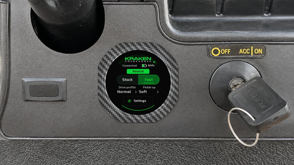 Kraken Tempo Lithium programmer mounted in a Club Car Tempo dash, beside the key switch